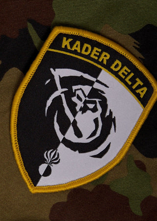 Kader Delta Badge