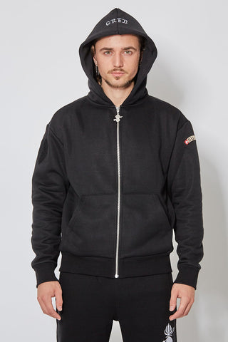 Schwarzer CH+ARMED Isone Gren Zip Hoodie aus 100% Baumwolle, Stickerei, Suisse Badge und personalisiertem Reissverschluss – Vorderansicht.