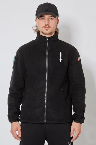 Schwarzer CH+ARMED MP Fleece aus Polyester mit weisser Schwert Stickerei, Suisse Badge und verstellbarem Bund – Vorderansicht.